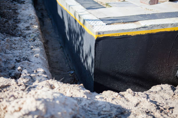Professional Basement Waterproofing technician working in Atlantic Beach, NY